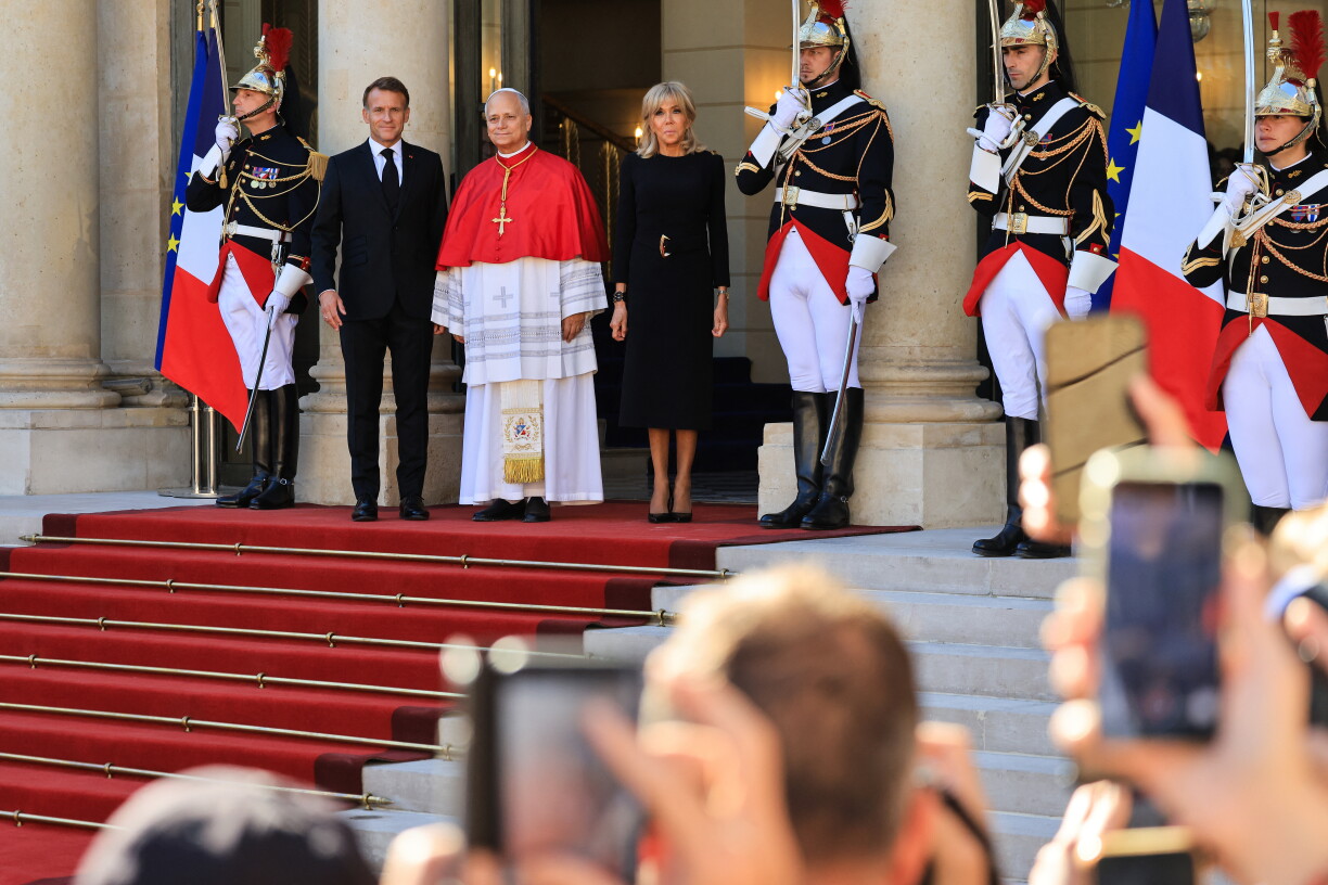 Emmanuel and Brigitte Macron receive Pope Leo Leo XIV in Paris.