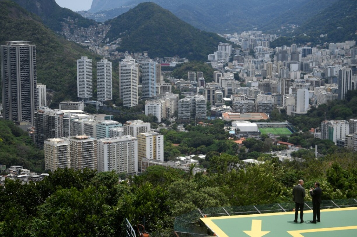 Britain's Prince William joined Rio de Janeiro's mayor Eduardo Paes on the famous Sugarloaf Mountain at the start of a visit raising awareness of global climate issues