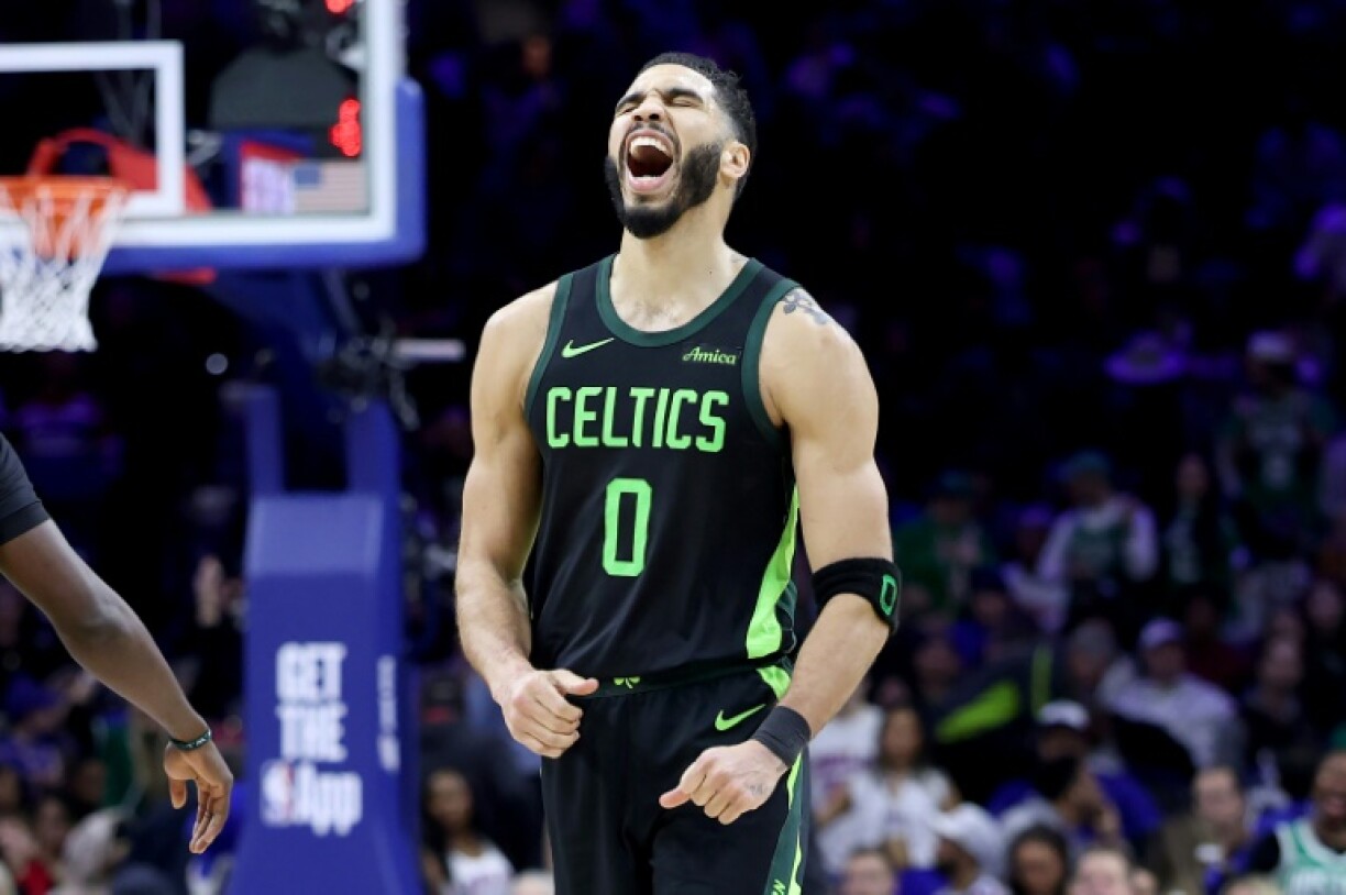 Jayson Tatum of the Boston Celtics celebrates a basket in the second half of the Celtics' come-from-behind NBA victory over the Philadelphia 76ers