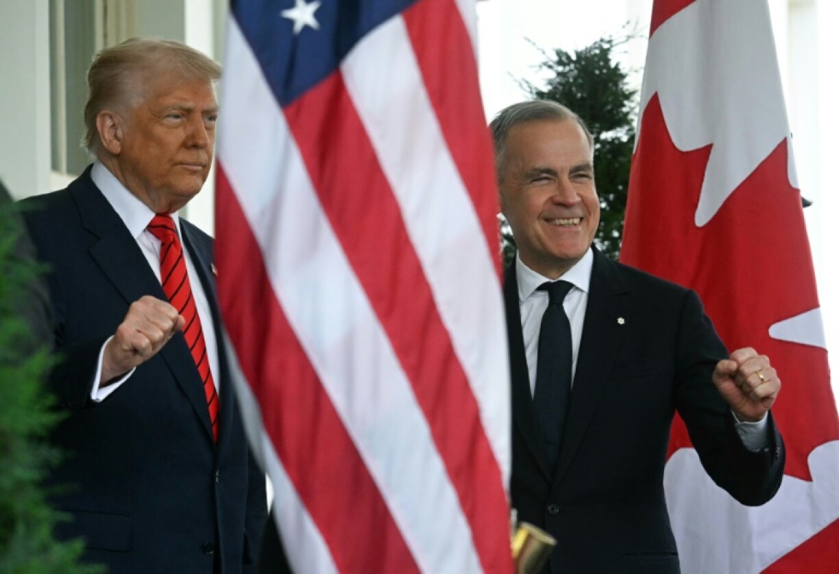 US President Donald Trump greets Canadian Prime Minister Mark Carney as he arrives at the White House in Washington, DC, on May 6, 2025.
