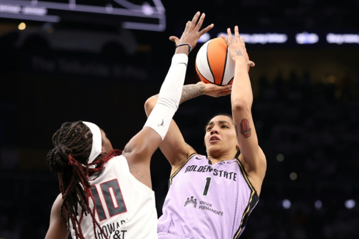 Golden State's Gabby Williams shoots over Atlanta's Rhyne Howard as the Valkyries level the WNBA Finals at 2-2