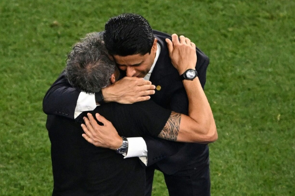 PSG president Khelaifi and coach Luis Enrique embrace after their team hammered Inter 5-0 in Saturday's final