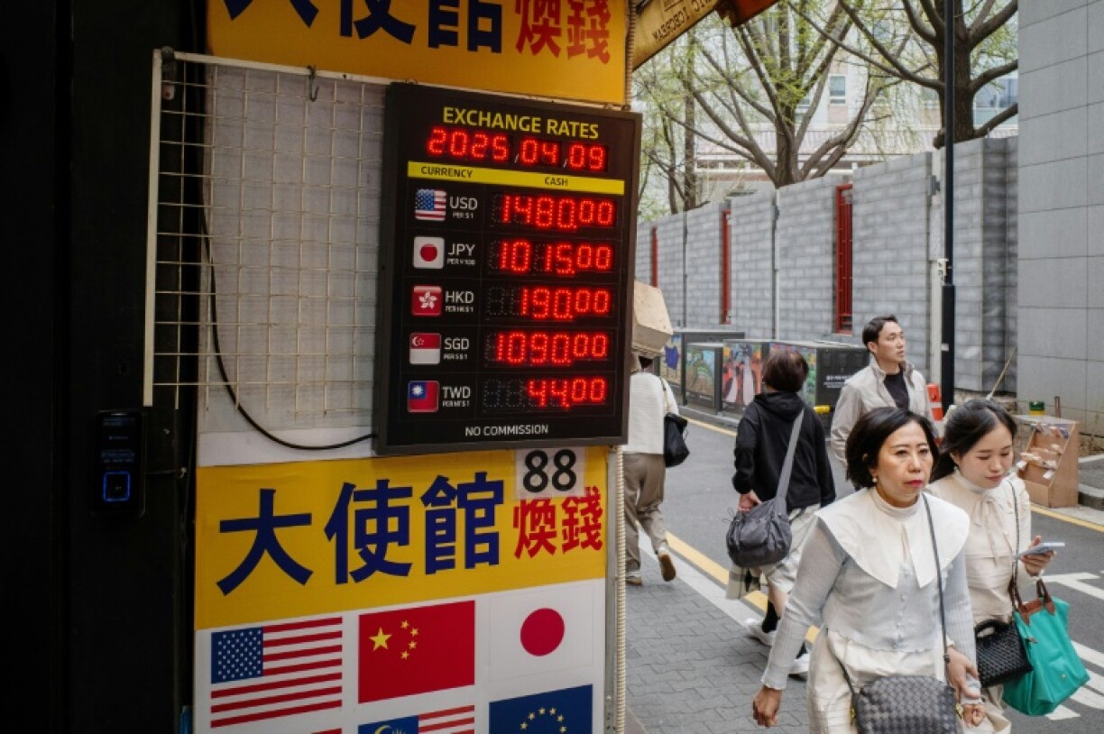 Musk called Trump's trade adviser and tariff champion Peter Navarro 'dumber than a sack of bricks'