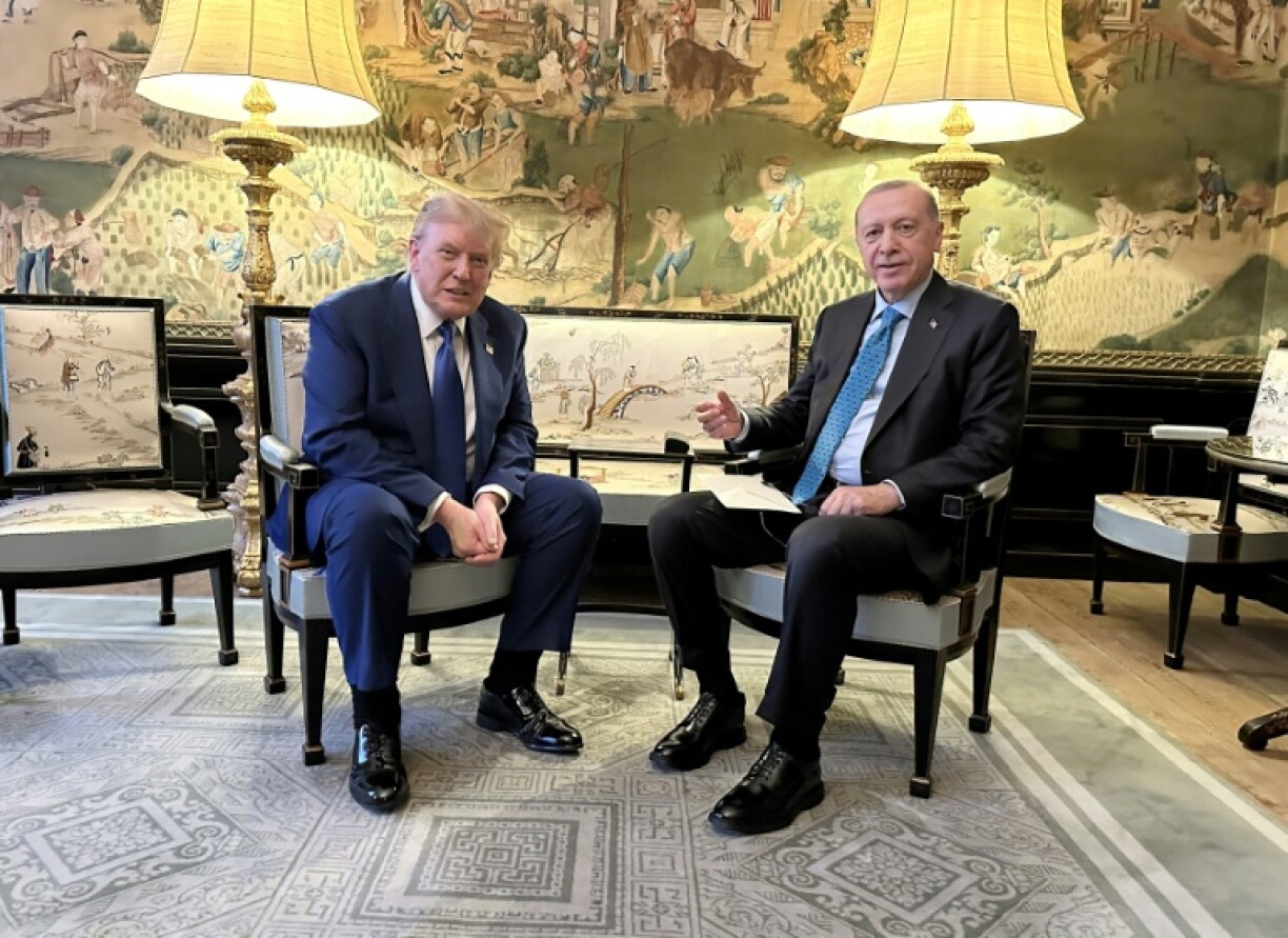 Turkey's President Recep Tayyip Erdogan (R) held talks with Donald Trump just hours after the US president announced a truce in the Iran-Israel war