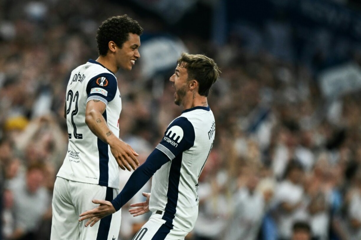 Tottenham forward Brennan Johnson (L) celebrates with James Maddison
