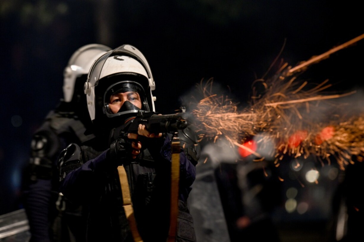 A police officer fires a prejectile against protesters during an anti-government demonstration in central Tirana on October 18, 2026, as protests continued for a sixth consecutive day over university conditions and demands for the resignation of Albania's Prime Minister. Albanian police fired water cannon and tear gas on October 18, 2026, as violent anti-government protests entered a sixth day and Prime Minister rejected demonstrators demands that he resigns. Violent demonstrations have rocked Tirana since October 13, 2026, with protesters calling for action over poor university conditions, high tuition fees and corruption. Hundreds of protesters gathered again at noon in front of the education ministry chanting