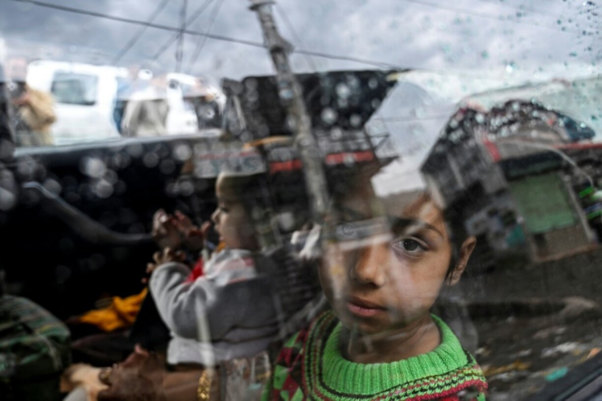 Four days of missile, drone and artillery attacks between the two countries killed at least 60 people and sent thousands fleeing