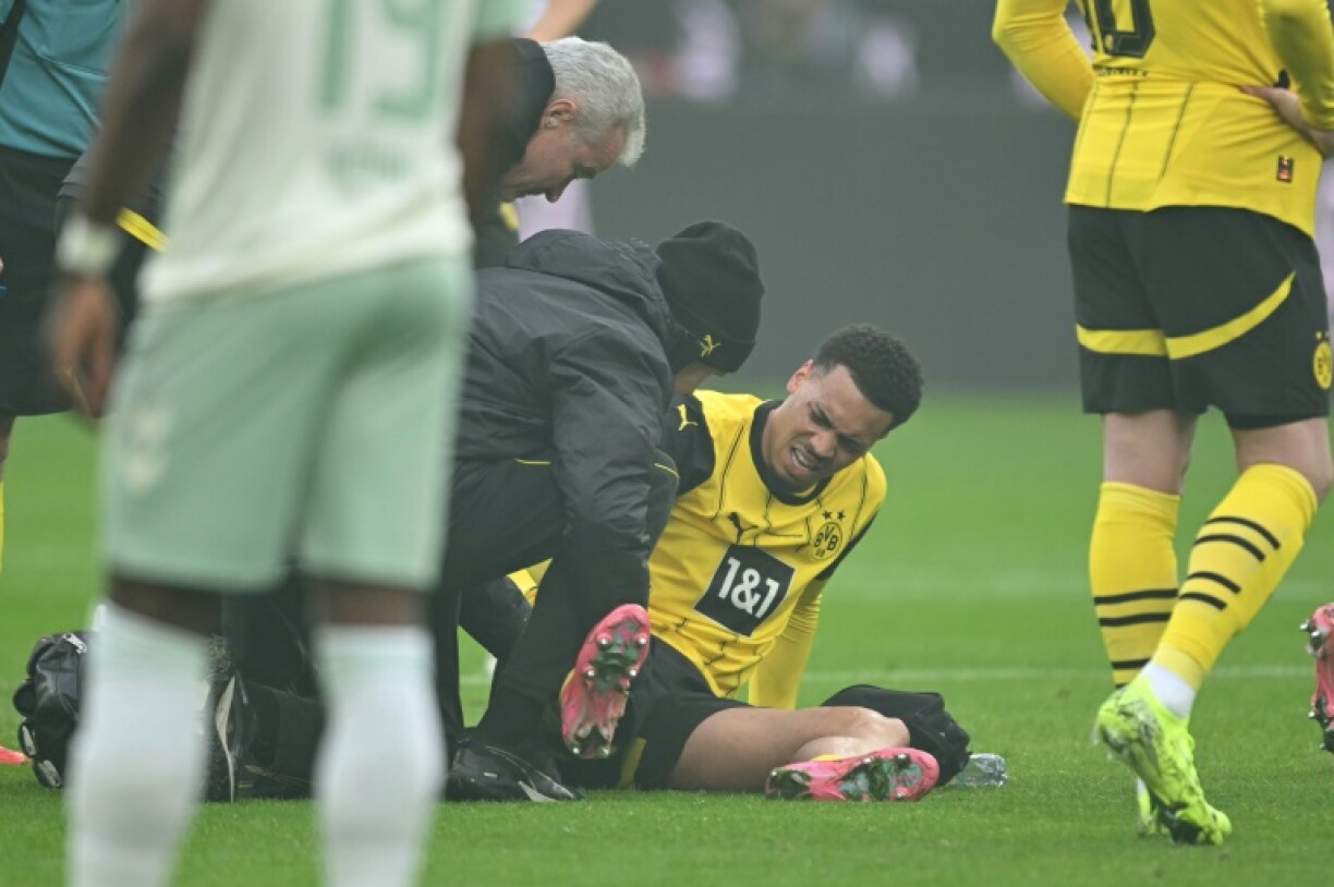 Dortmund's German midfielder Felix Nmecha went down after a challenge and was subbed out 12 minutes into Saturday's 2-2 home draw with Werder Bremen