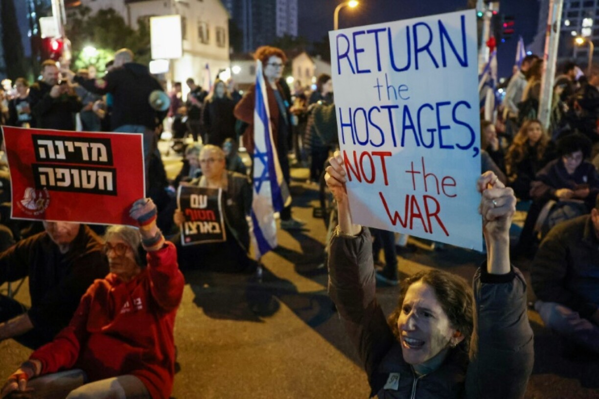 Family members and friends of Israeli hostages held in Gaza demand their government implement the ceasefire rather than restart the war