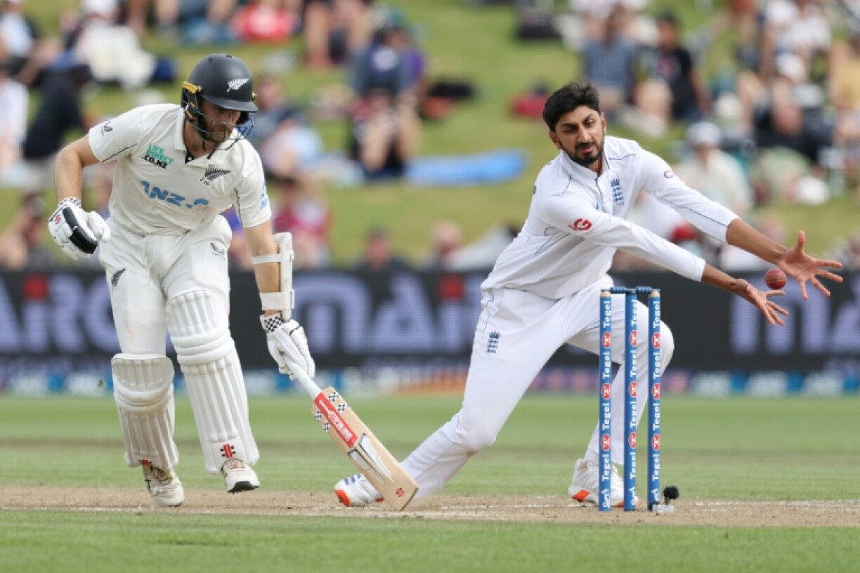 New Zealand’s Kane Williamson grabs a quick run in the third Test