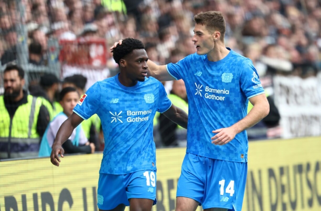 Bayer Leverkusen striker Patrik Schick (R) will miss several matches with a thigh injury.