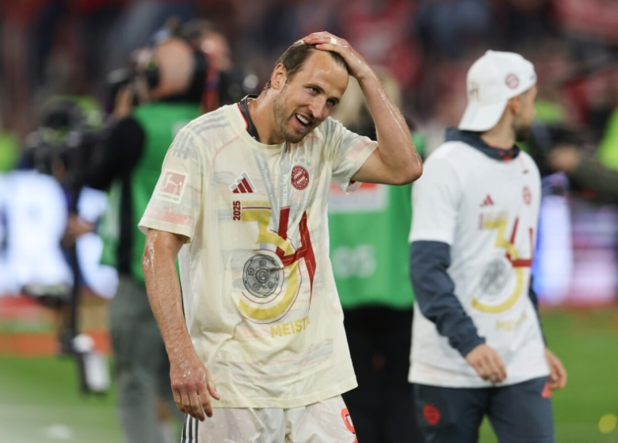 Bayern Munich striker Harry Kane after being soaked with beer in the club's Bundesliga trophy celebrations