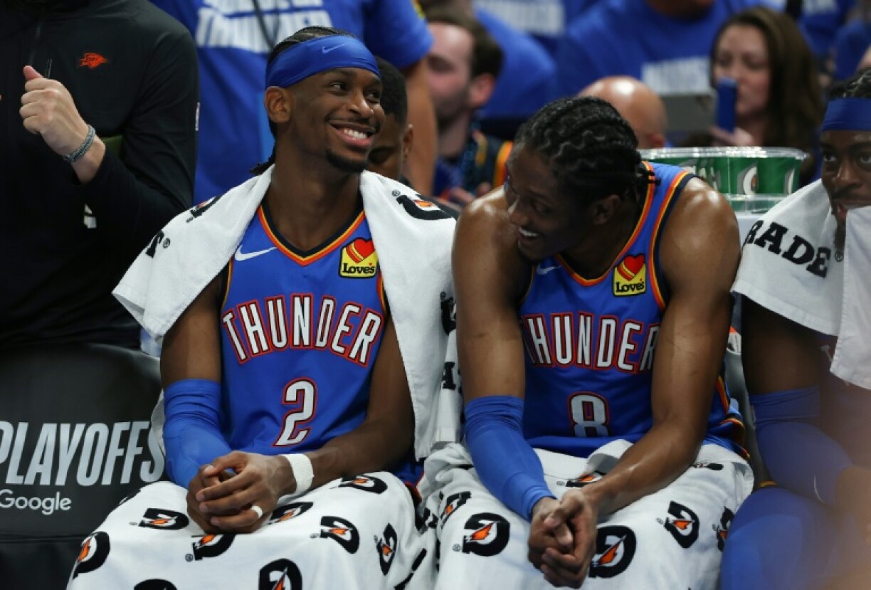 Shai Gilgeous-Alexander and Jalen Williams of the Oklahoma City Thunder react during game five of the NBA Western Conference finals against the Minnesota Timberwolves