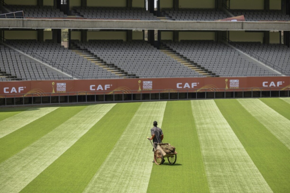 A groundkeeper puts the finishing touches to the pitch in Nairobi ahead of the African Nations Championship