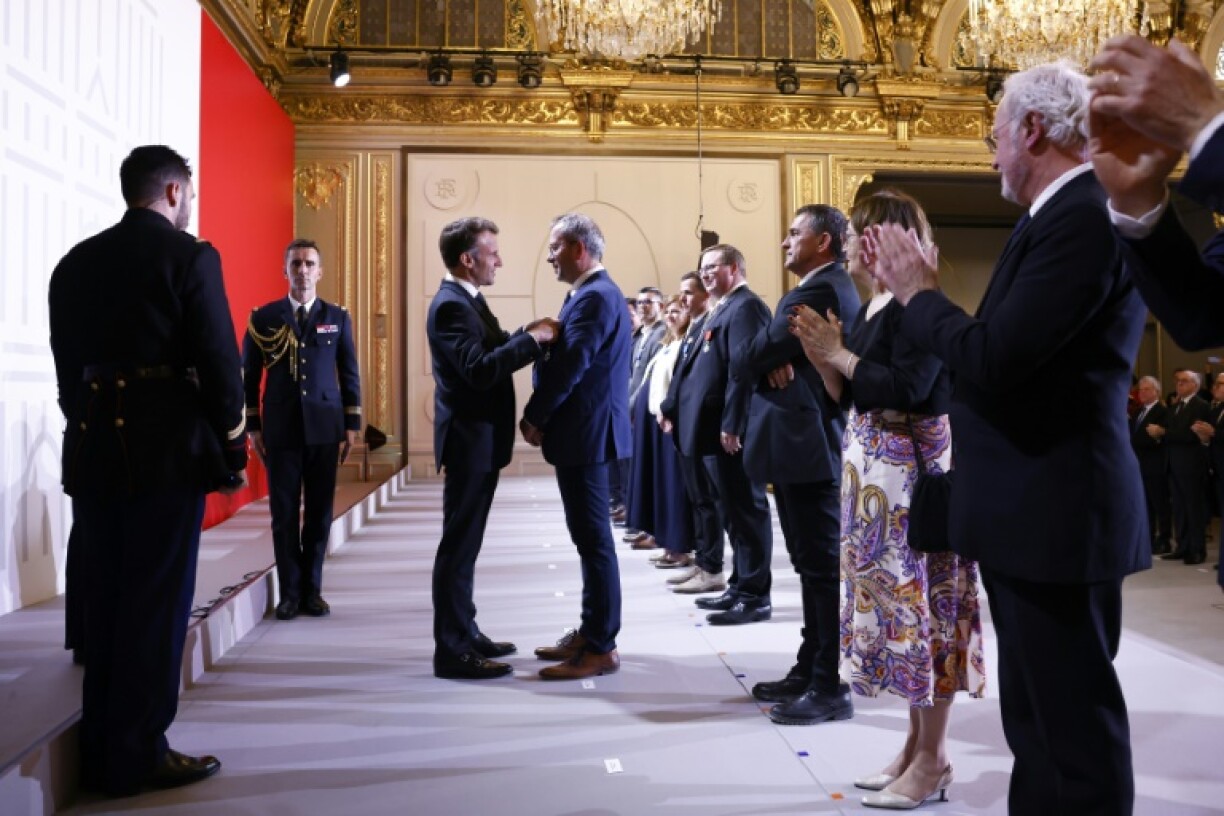 France's President Emmanuel Macron handed out multiple medals