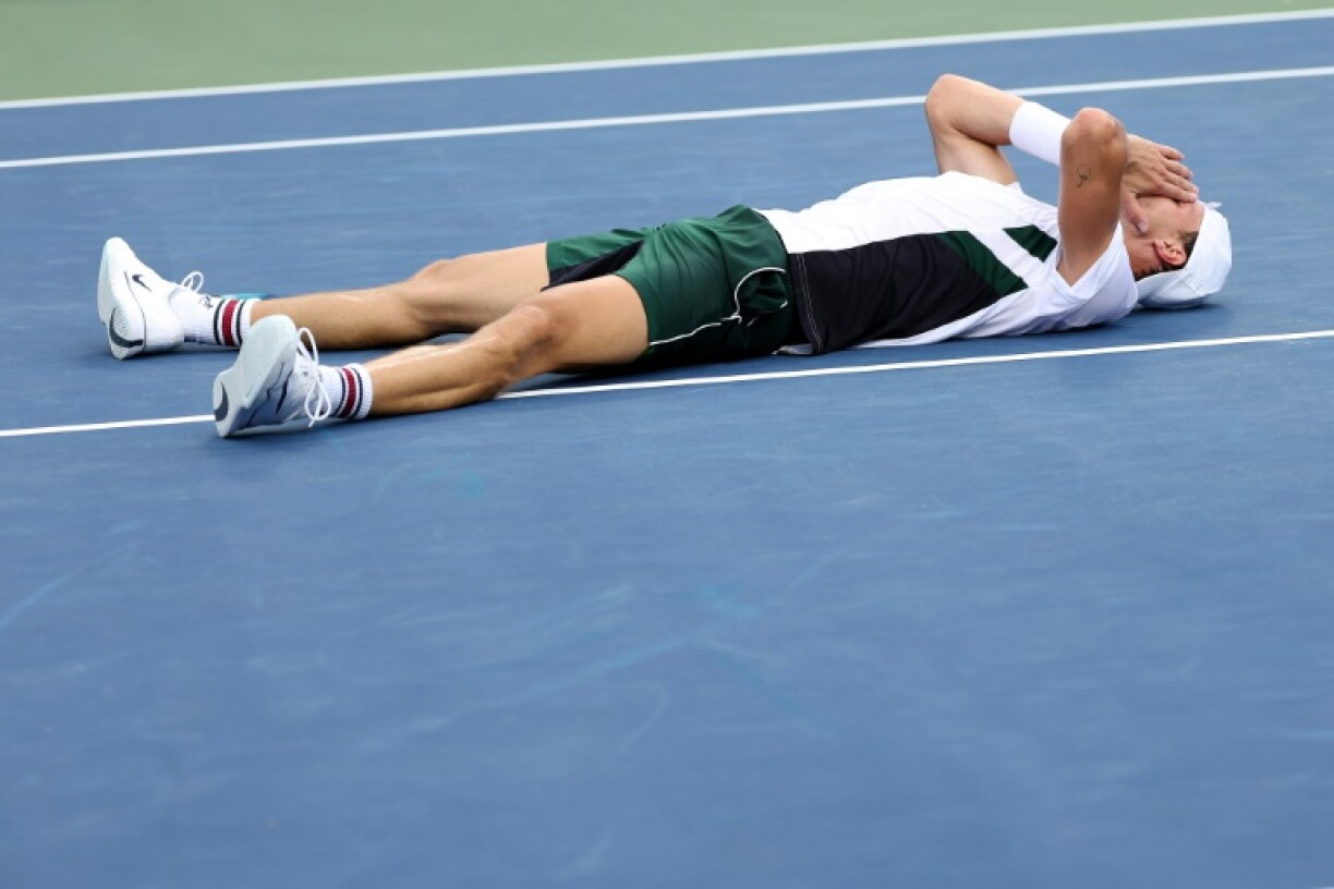 Hungary's Marton Fucsovics reacts after beating Botic van de Zandschulp in the ATP Winston-Salem final