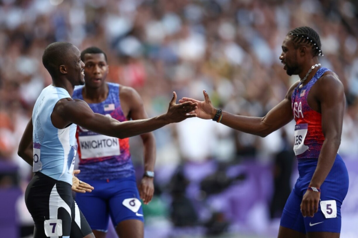 US' Noah Lyles congratulates Botswana's Letsile Tebogo after the men's Olympic 200m final in Paris last summer