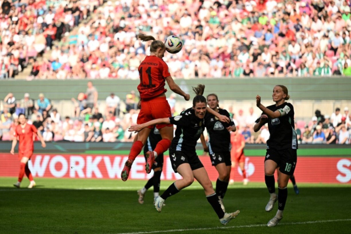 Lea Schueller (C) heads home Bayern Munich's third goal in their 4-2 German Cup final win against Werder Bremen