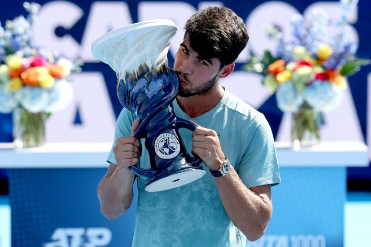 Carlos Alcaraz celebrates his Cincinnati Open final victory after Jannik Sinner retired in the first set of their final