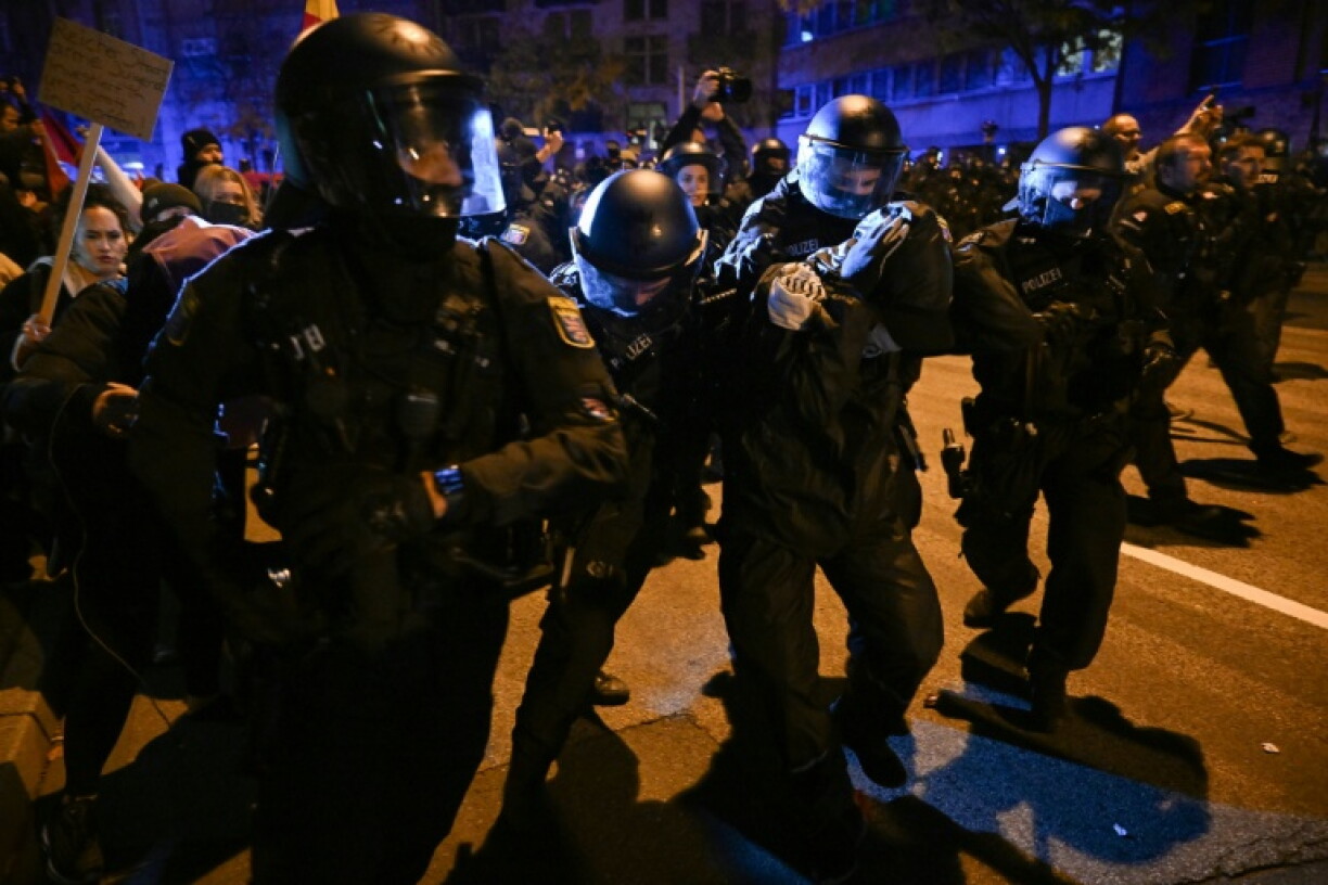 Police detained a protester after a demonstration turned violent in the German city of Frankfurt