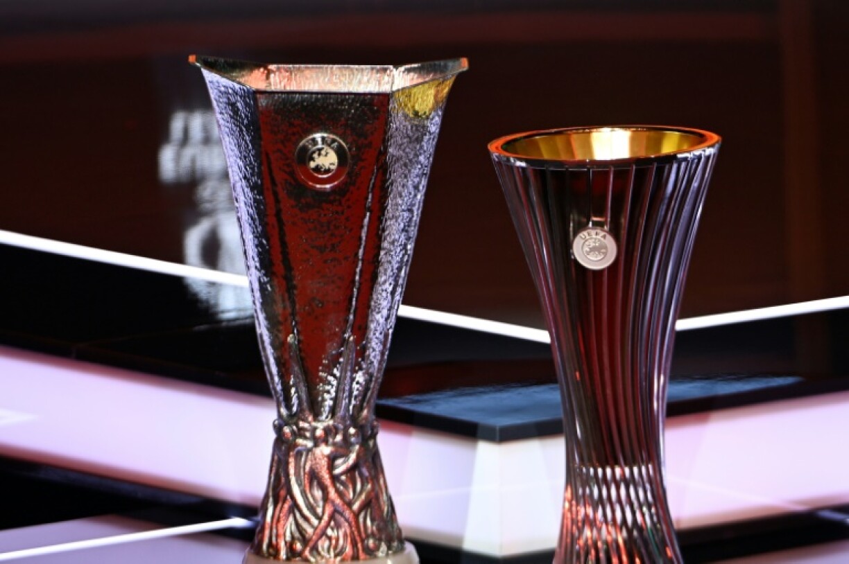 The Europa League and Conference League trophies on display in Monaco on Friday ahead of Friday's draw for both tournaments