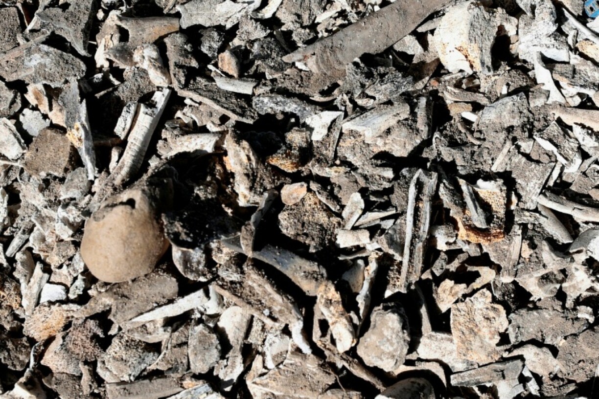 Charred bones are seen at a ranch in Mexico believed to have been used as a cartel training ground