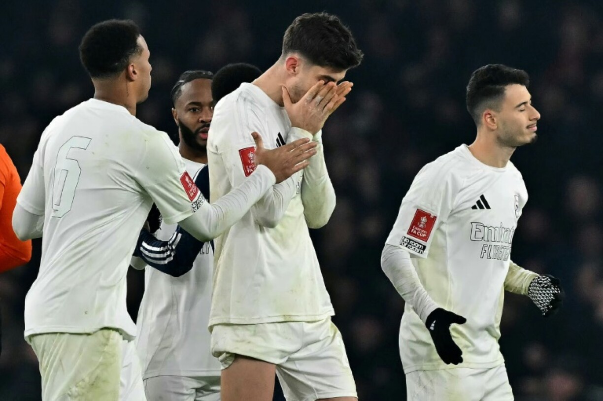 Arsenal's Kai Havertz covers his face after the penalty shootout defeat against Manchester United