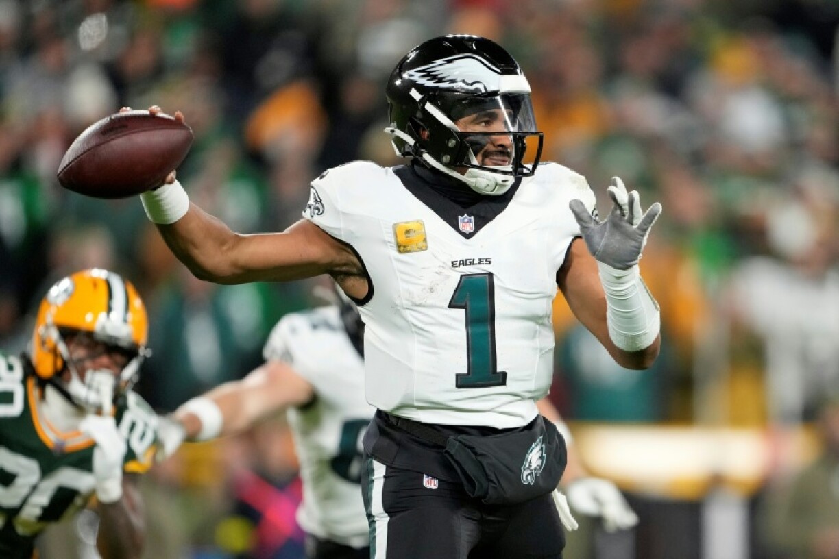 Jalen Hurts of the Philadelphia Eagles throws a pass in an NFL victory over the Green Bay Packers