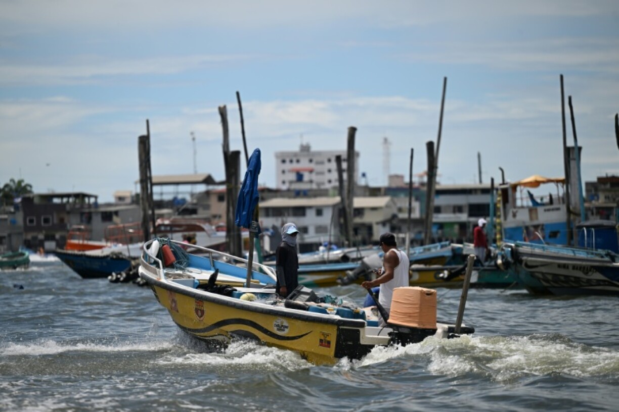 Fishermen sail in the Huayala Estuary, in the Jambeli Archipelago in the province of El Oro, Ecuador The once-thriving port of Puerto Bolivar is nearly dormant, with no ships in sight, as local fishermen, particularly vulnerable to the drug violence that plagues the region, are afraid to speak out.