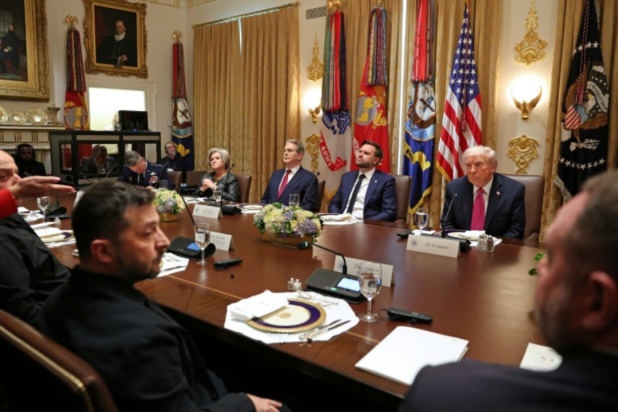 US President Donald Trump meets with Ukrainian President Volodymyr Zelensky (L) at the White House on October 17, 2025