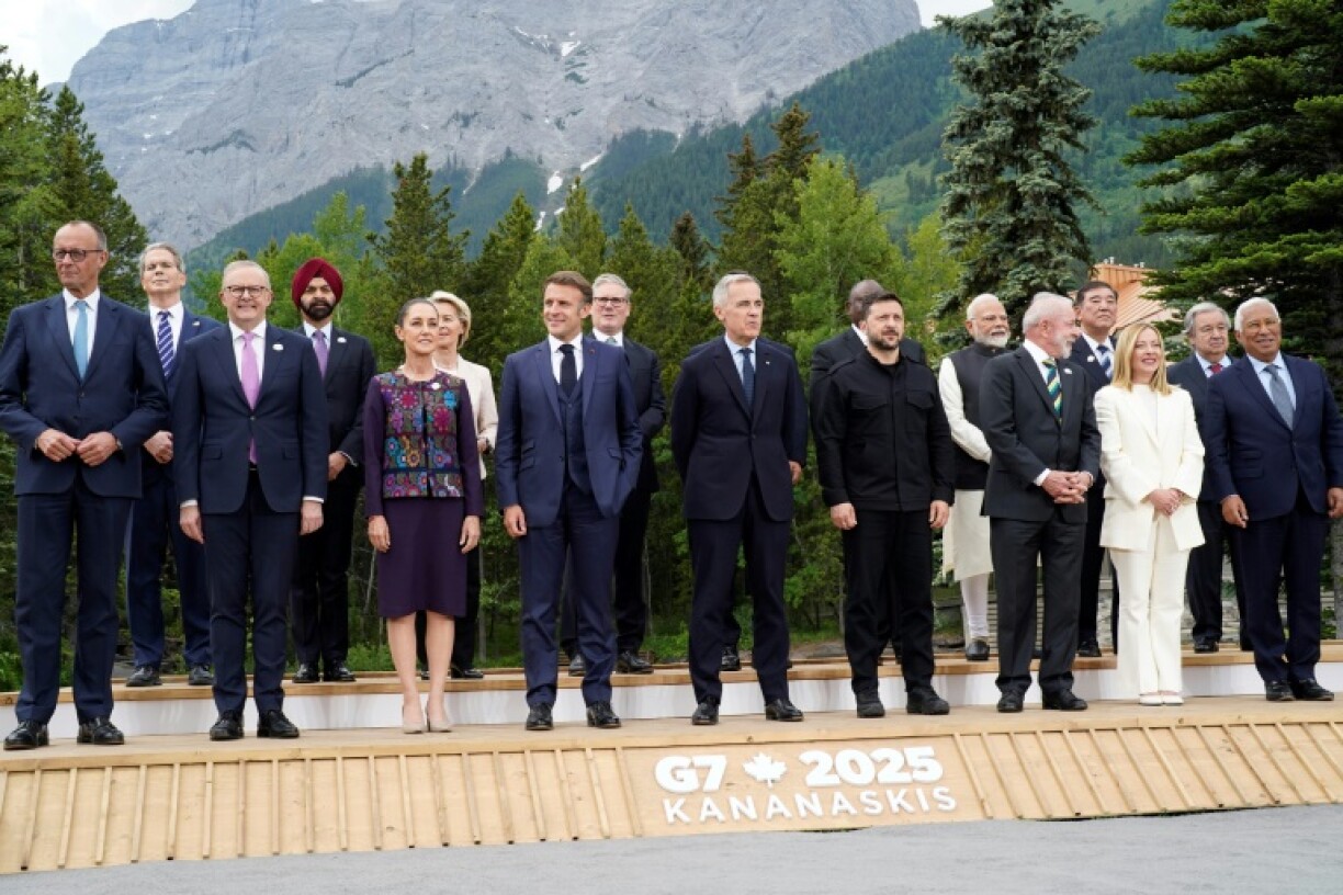 L/R, top row) US Secretary of Treasury Scott Bessent, World Bank President Ajay Banga, European Commission President Ursula Von der Leyen, British Prime Minister Keir Starmer, South Korean President Lee Jae-myung, South African President Cyril Ramaphosa, Indian Prime Minister Narendra Modi, Japanese Prime Minister Shigeru Ishiba, UN Secretary General Antonio Guterres, NATO Secretary General Mark Rutte, (L/R, bottom row) German Chancellor Friedrich Merz, Australian Prime Minister Anthony Albanese, Mexican President Claudia Sheinbaum, French President Emmanuel Macron, Canadian Prime Minister Mark Carney, Ukrainian President Volodymyr Zelensky, Brazilian President Luiz Inacio Lula da Silva, Italian Prime Minister Giorgia Meloni and European Council President Antonio Costa pose for a family photo during the Group of Seven (G7) Summit at the Kananaskis Country Golf Course in Kananaskis, Alberta, Canada on June 17, 2025.