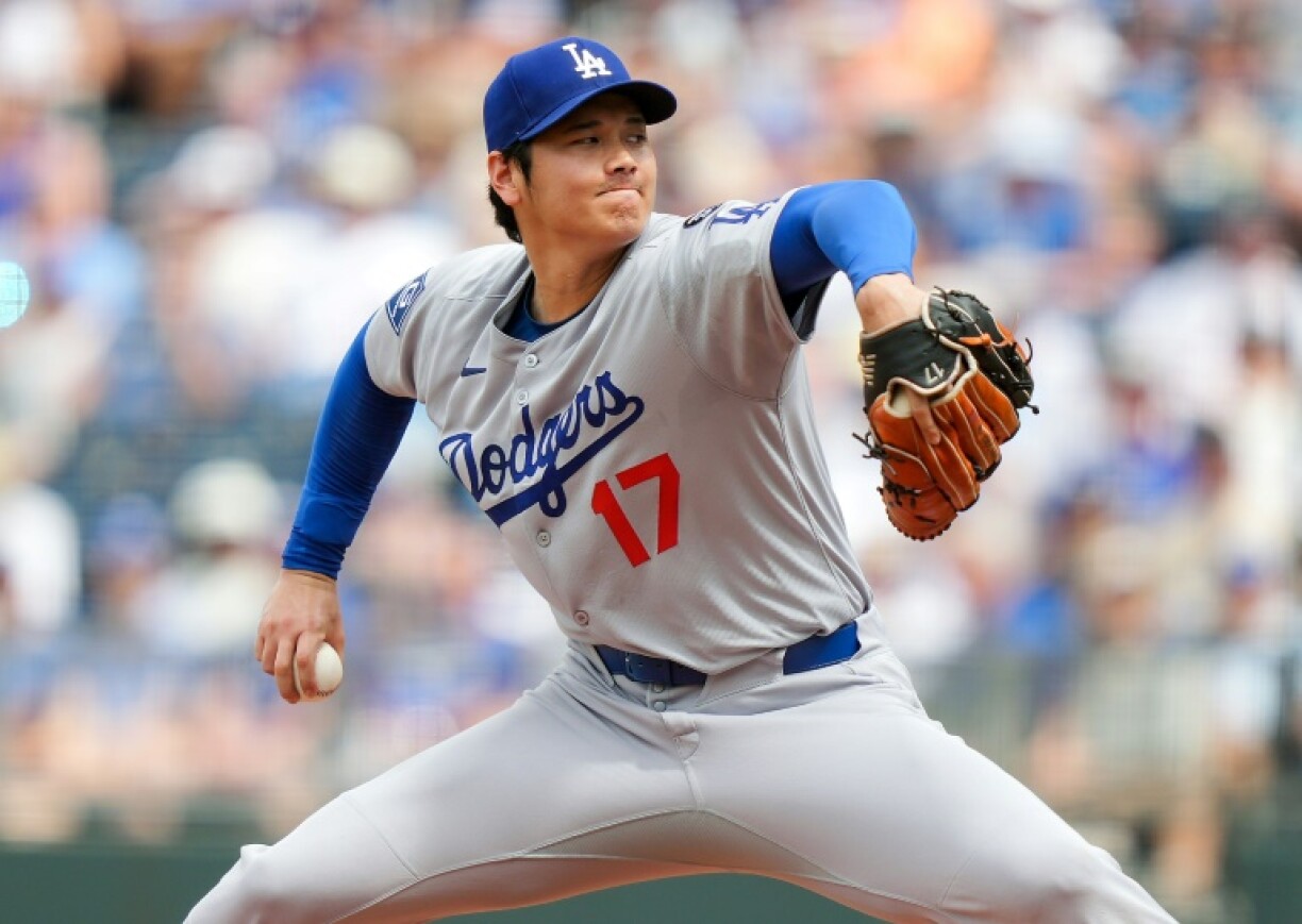 Shohei Ohtani of the Los Angeles Dodgers pitches against the Kansas City Royals