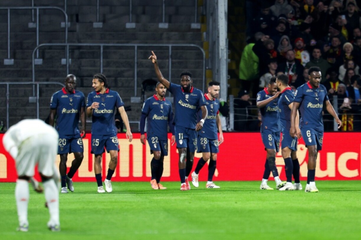 Odsonne Edouard (au centre, bras levé) et ses coéquipiers lors de la victoire de Lens face à Nice (2-0) dimanche 14 décembre 2025 au stade Bollaert. Les Sang et Or passeront les fêtes de fin d'année au sommet de la L1