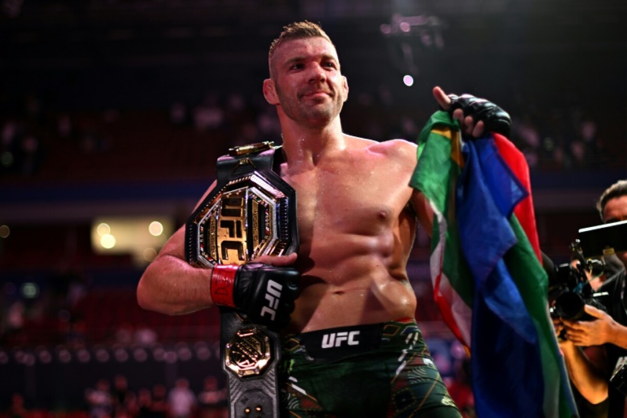 South Africa's Dricus du Plessis celebrates his victory over Sean Strickland in the UFC middleweight title bout