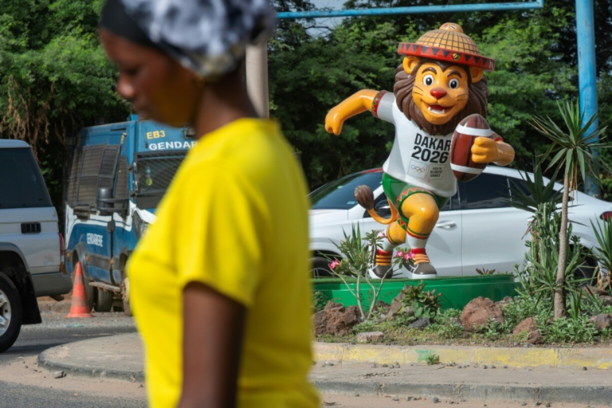 Statues of the Youth Olympics mascot Ayo the lion playing various sports have been installed throughout Dakar