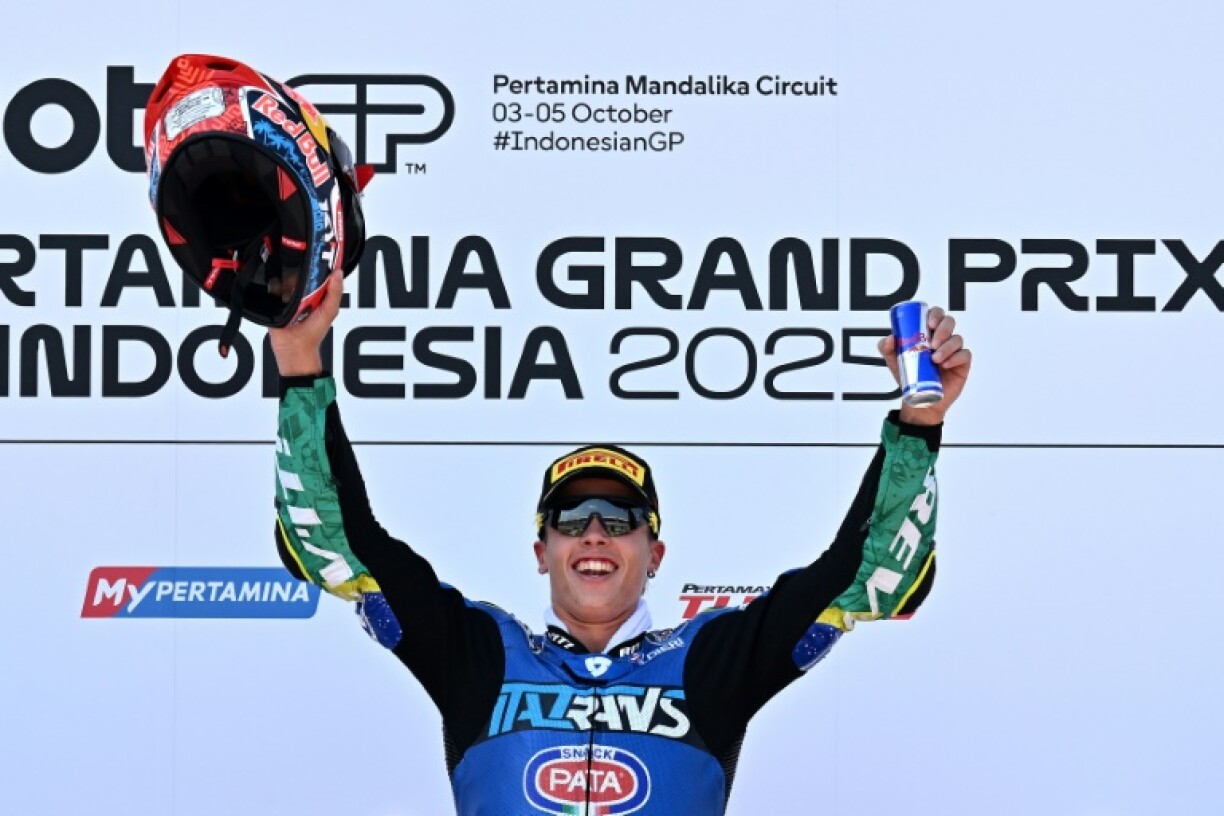 Diogo Moreira on the podium after winning the Moto2 class race of the MotoGP Indonesian Moto2 Grand Prix earlier in October