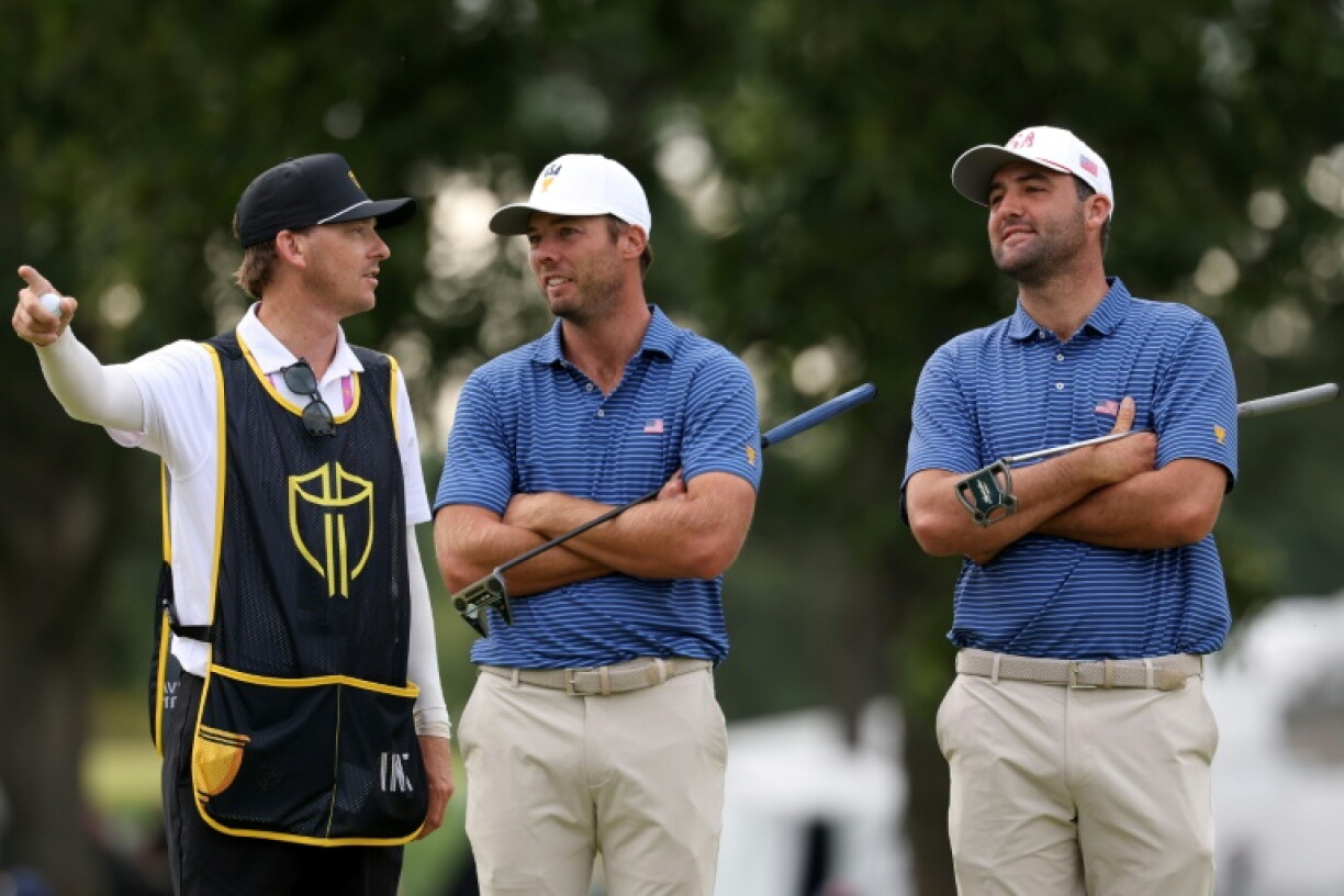 In the marquee matchup of the opening day of the Presidents Cup at Medinah, Scottie Scheffler and Sam Burns edged South Korean Im Sung-jae and Australian Min Woo Lee 1-up