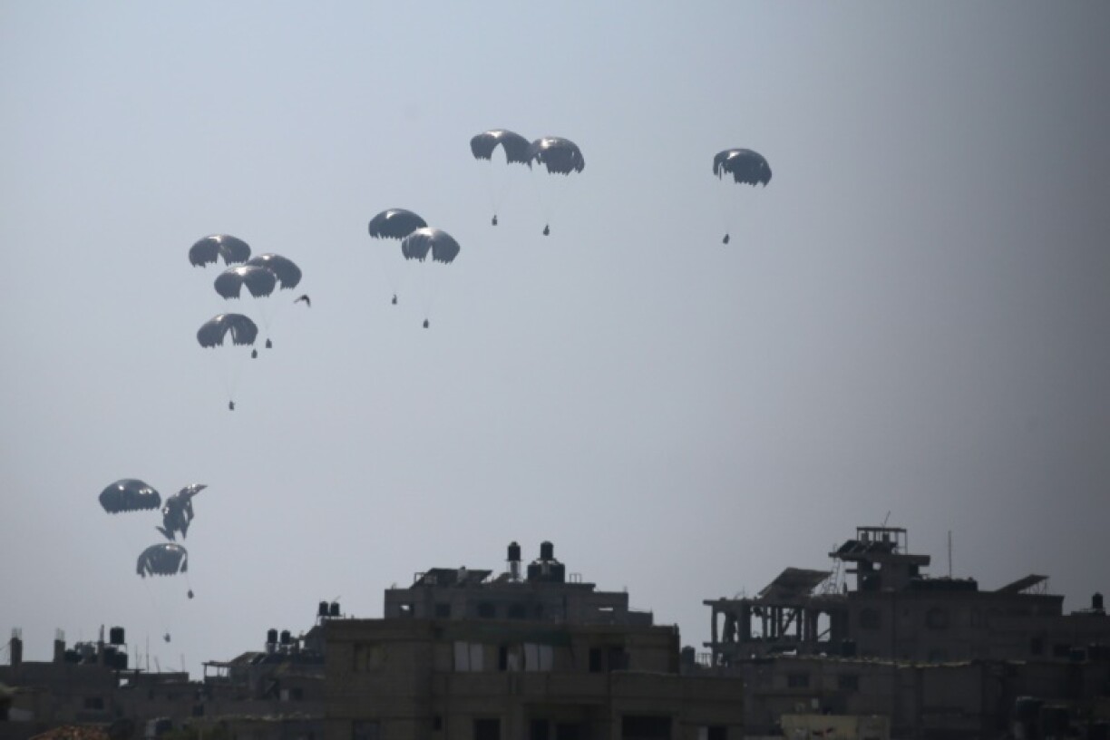 Miltary transport planes from Jordan and the the United Arab Emirates have begun to drop food pallets into Gaza, but the bulk of the aid effort will have to be carried by trucks