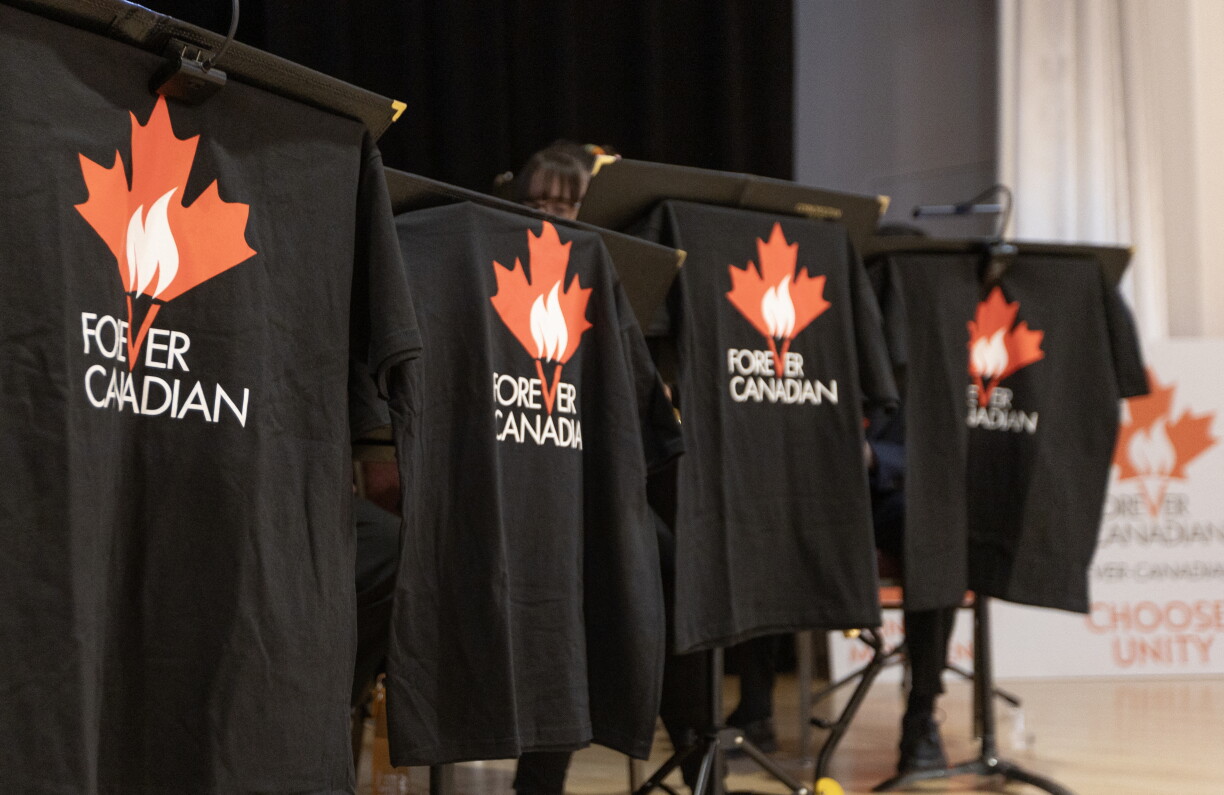 Forever Canadian T-shirts hang on display at a pro-Canada rally at Polish Hall in downtown Edmonton, Alberta, ahead of the referendum results on October 19, 2026.