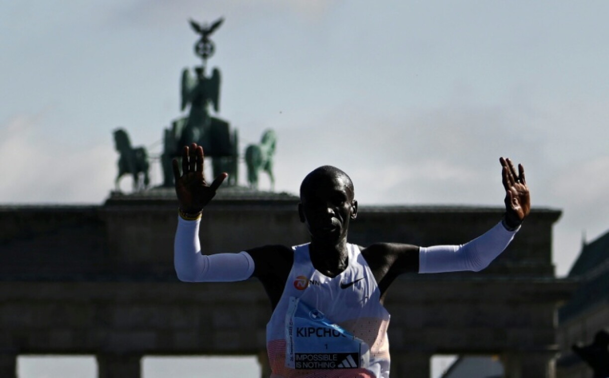 Kenya's Eliud Kipchoge crosses the finish line to win the men's race of the Berlin Marathon in 2023.