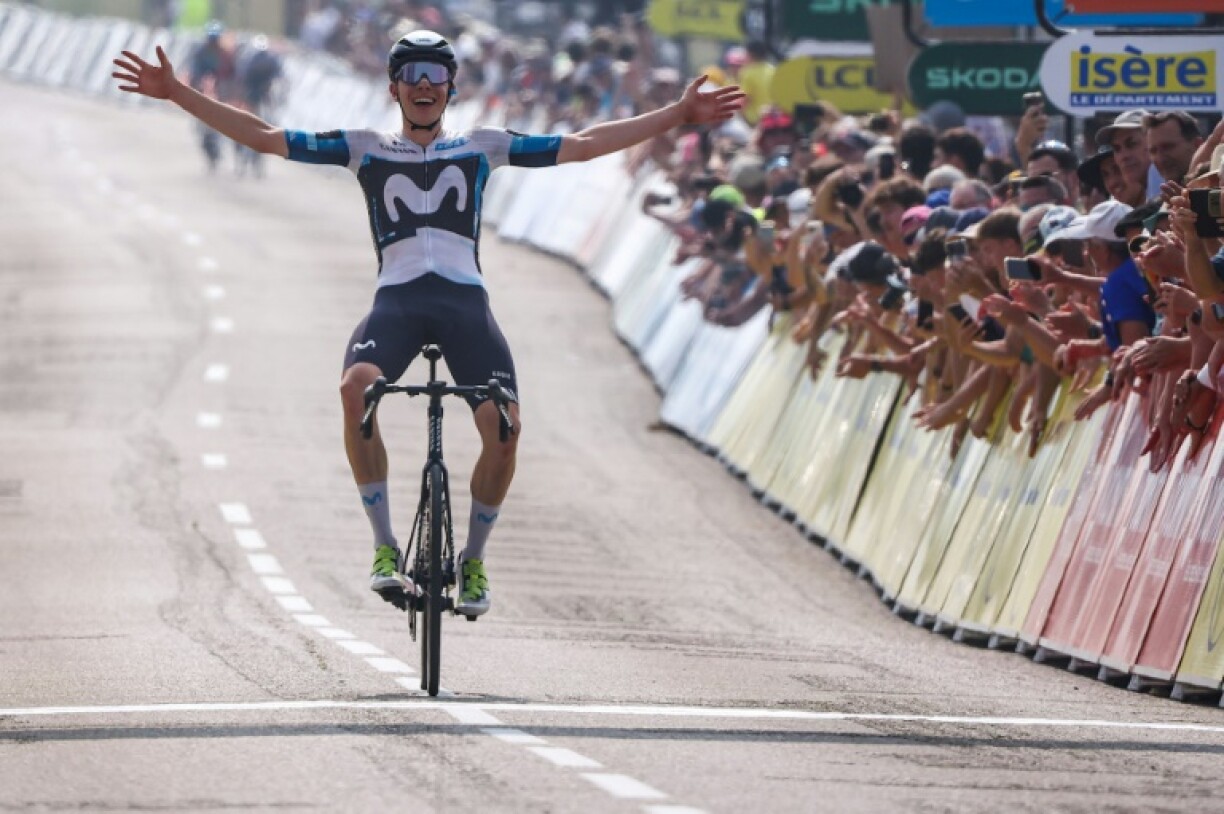 Ivan Romeo celebrates as he crosses the finish line to win the third stage of the 77th edition of the Criterium du Dauphine
