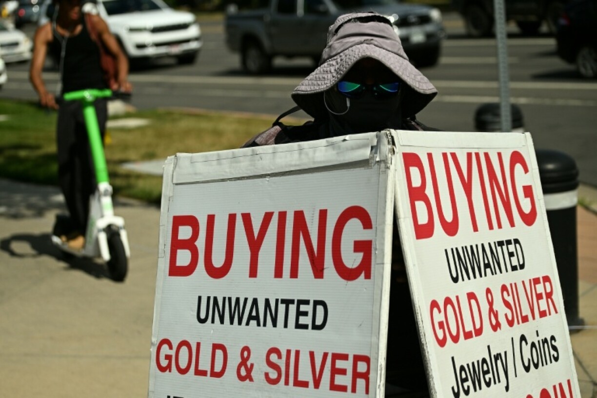 The price of silver topped $50 an ounce, rising to levels not seen in decades