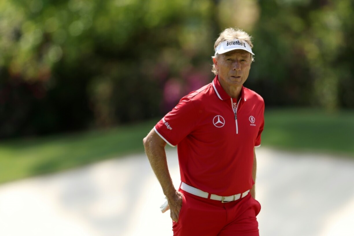 Two-time Masters winner Bernhard Langer walks off the 13th green after a bogey as the 67-year-old German began his 41st and final Masters appearance