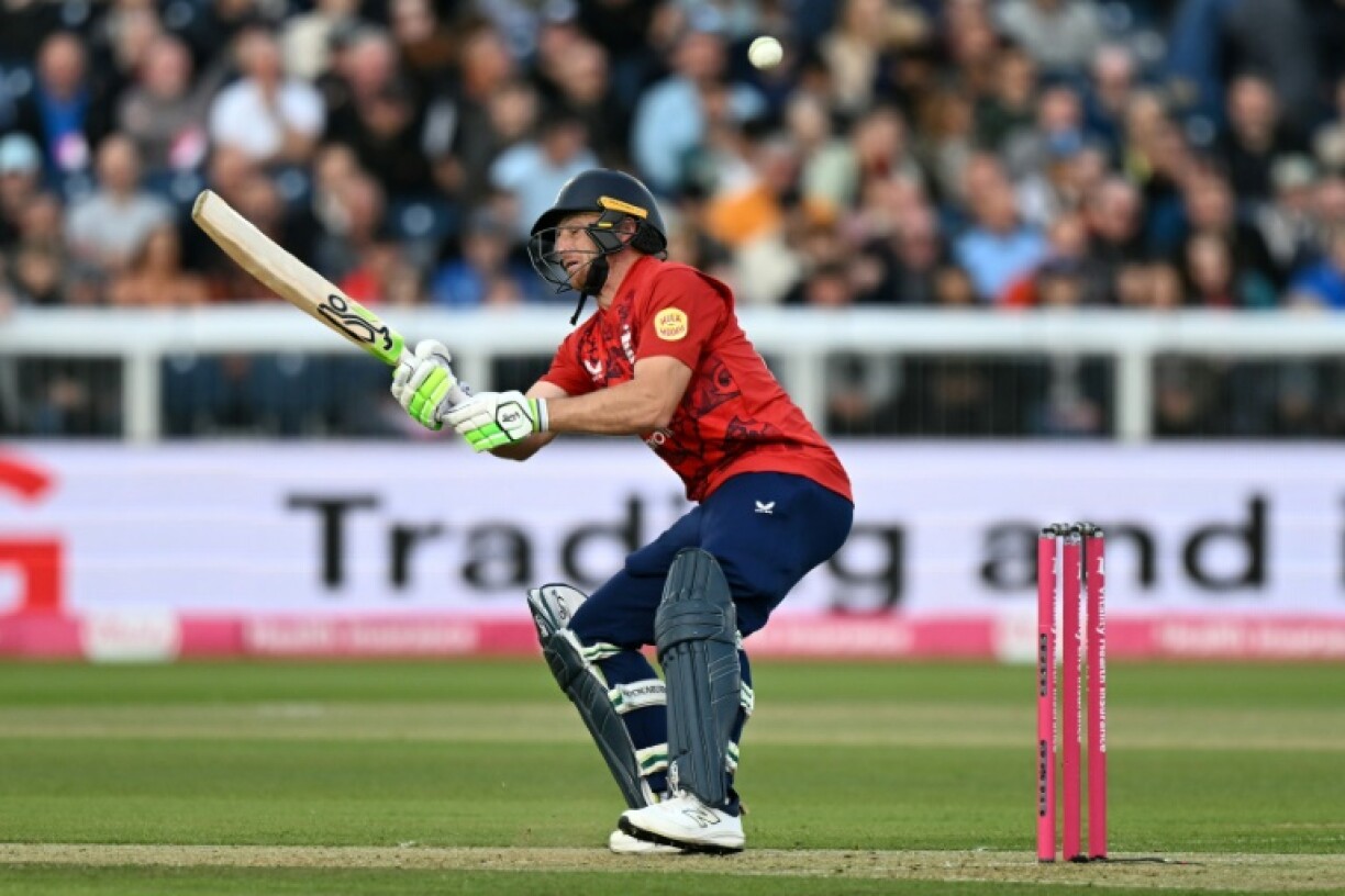 England's Jos Buttler scoops a ball from West Indies' Alzarri Joseph on his way to 96 in the 1st T20 international at Chester-le-Street