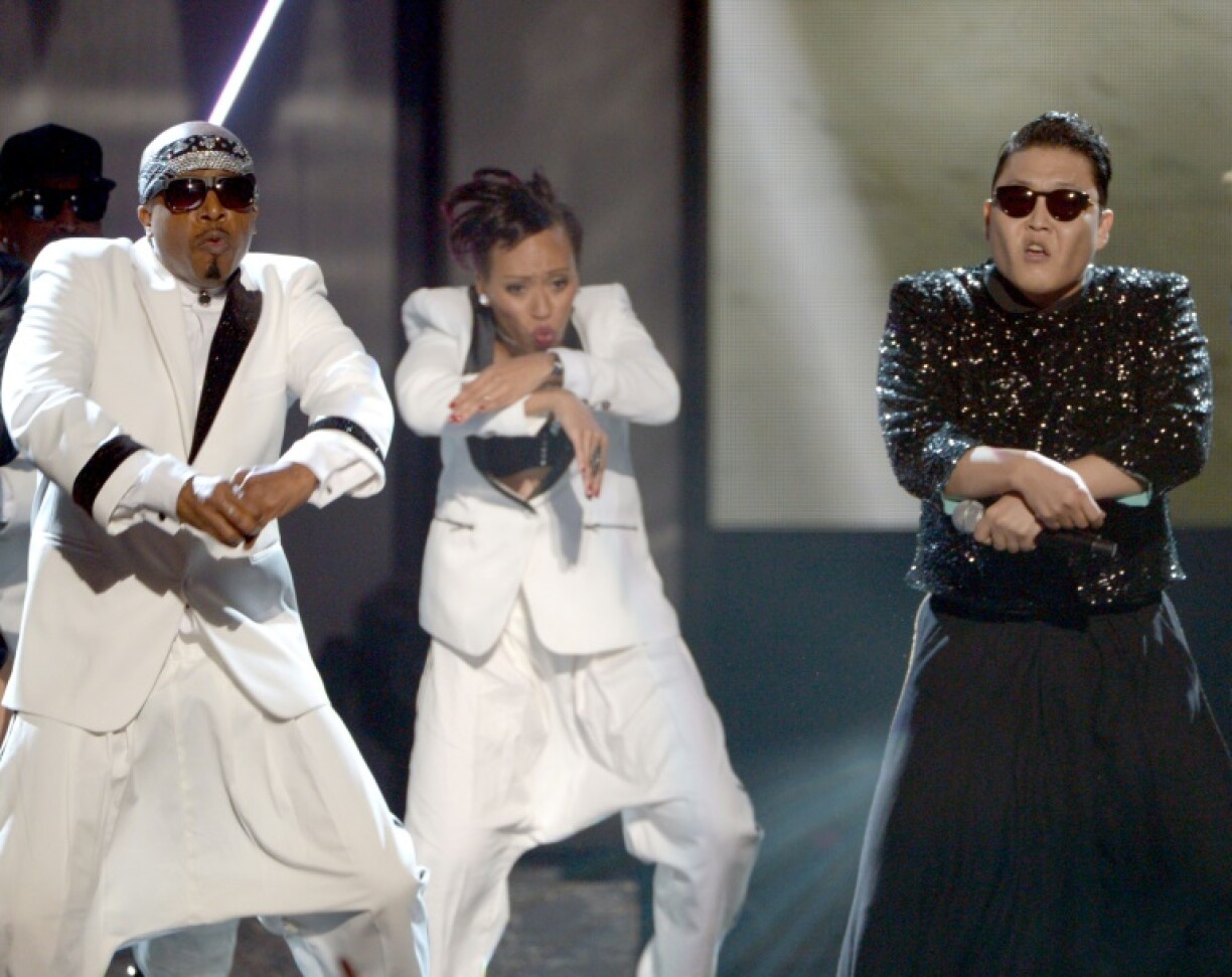 MC Hammer (L), seen here with South Korean singer PSY (R) in 2012, is being sued in California over an allegedly unpaid car loan