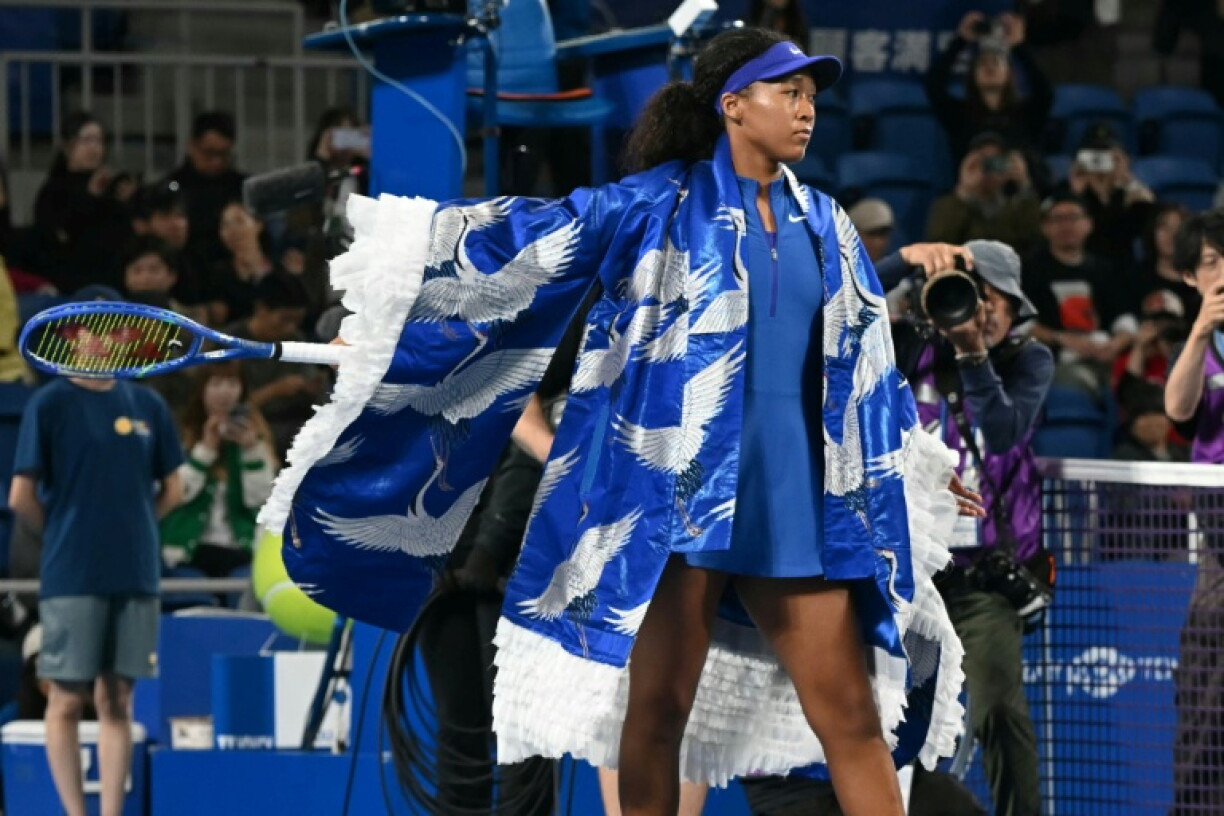 Naomi Osaka wore a blue outfit with a crane pattern before her match against Jasmine Paolini at the Pan Pacific Open in Tokyo