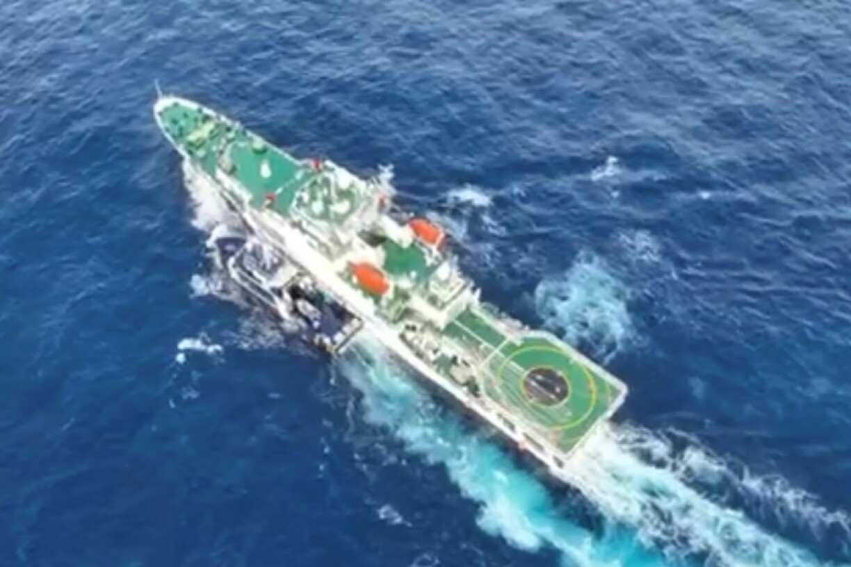 A frame grab from a handout video released by the Philippines shows an apparent collision between a China Coast Guard ship (R) and a fisheries department vessel