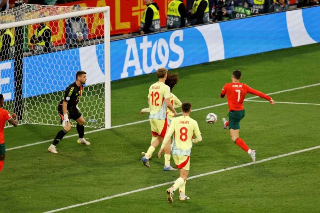 Cristiano Ronaldo volleys home Portugal's second equaliser against Spain