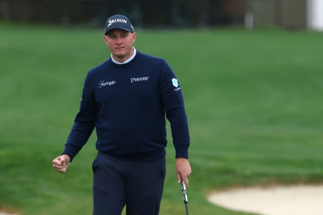 Sepp Straka of Austria celebrates a birdie putt at the 17th hole on his way to taking a one-stroke lead after three rounds at the PGA Pebble Beach Pro-Am