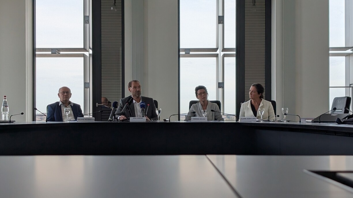 A panel from the University of Luxembourg face journalists regarding recent allegations.